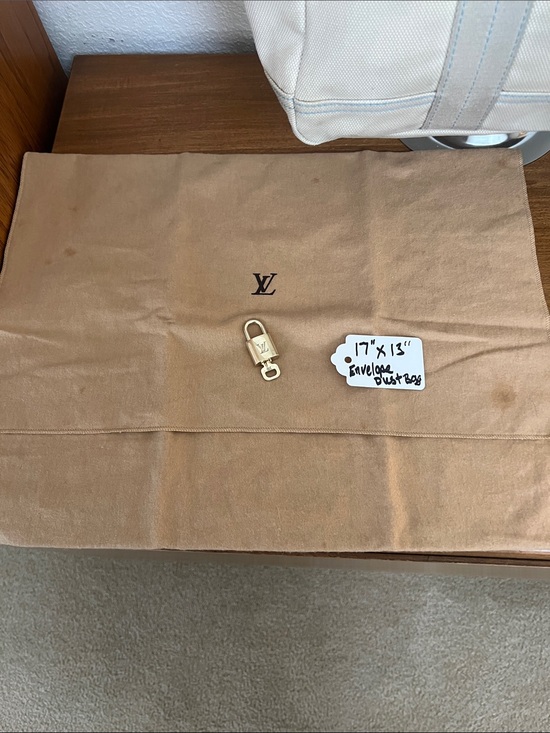 Louis Vuitton Accessories - Louis Vuitton lock key and large dust bag GUC